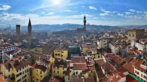 Aerial view of the city of Florence with the tower of Palazzo Vecchio, the seat of the municipality of Florence, in the center photo