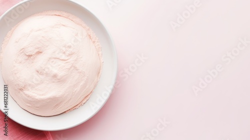 pink dough in a plate.