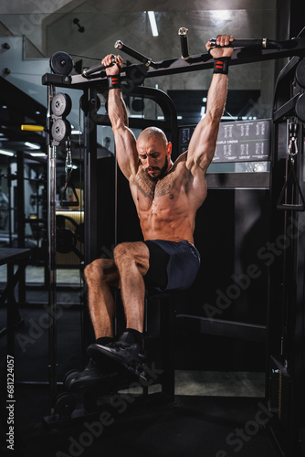 Sit-ups Workout In A Gym On Bars