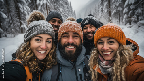 selfie photo of a group of friends having fun during winter vacations holydays, wintersport in the snow smiling