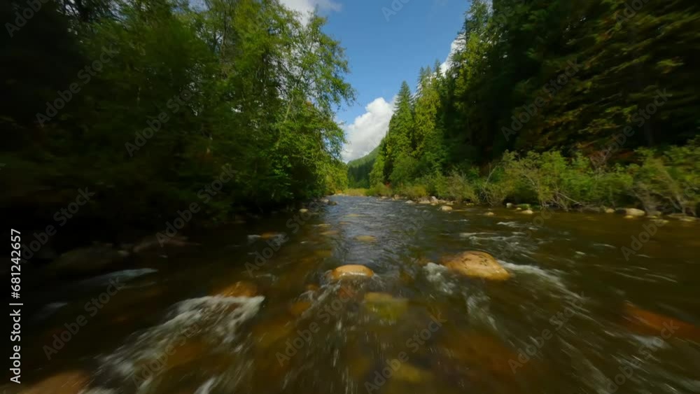 Flight over a mountain river. Shot on FPV drone. British Columbia, Canada. Flight over a mountain river. Shot on FPV drone. British Columbia, Canada.