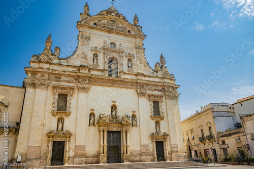 Galatina, Lecce, Puglia, Italy. Ancient village in Salento. The wonderful Church of Saints Peter and Paul, in baroque style. Many marble statues and sculptures adorn the facade of the church.