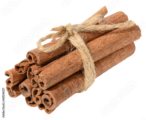 Dry cinnamon sticks tied with brown jute rope on a white isolated background