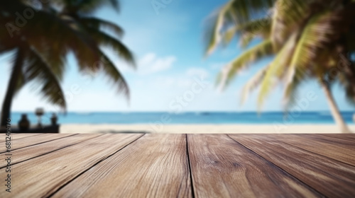 Empty table, sea and palm trees in blurred background