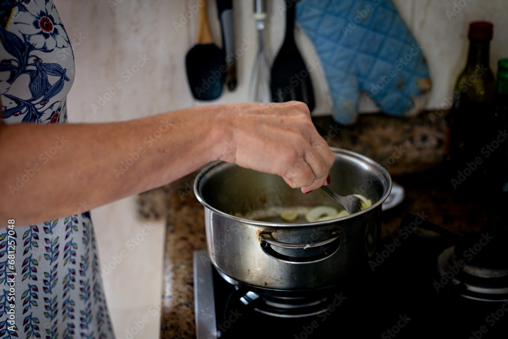 Meat and onions being fried in the pan. Meat and onions being fried in the pan.