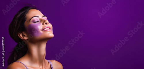 portrait of a young woman on purple background with copy space. women's day