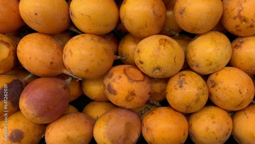 video of a group of passion fruit in a local market. Fruit and food concept. video of a group of passion fruit in a local market. Fruit and food concept.