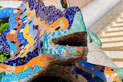 Multicolored mosaic dragon salamander of Gaudi in Park Guell, Barcelona, Spain photo