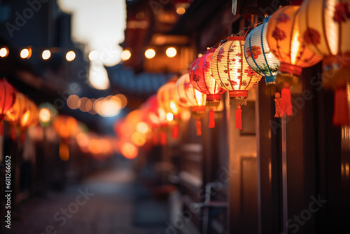 Lanterns hanging in the streets of China town. Chinese New Year concept © LorenaPh