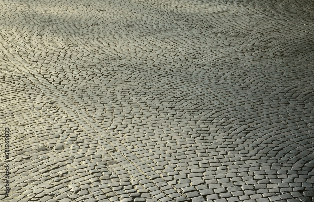 A large area, covered with a quality paving stone in daylight A large area, covered with a quality paving stone in daylight