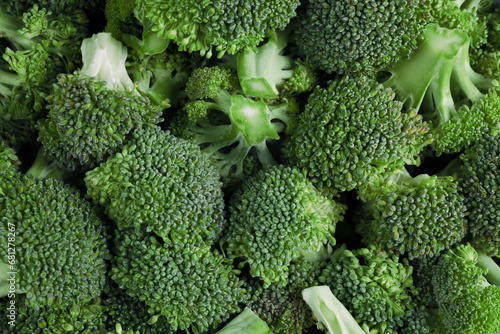 Fresh raw broccoli as background, top view