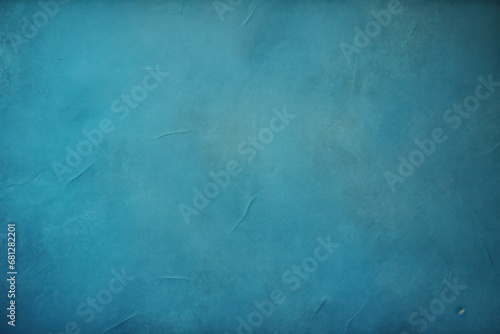Beautiful blue color grunge background with copy space, abstract stucco wall texture with holes and scuffs photo