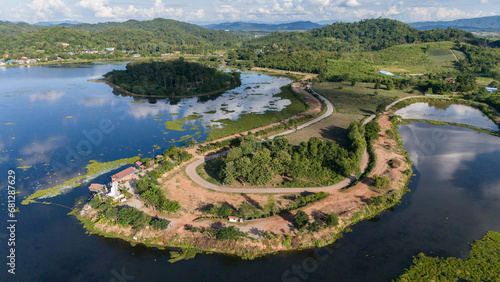 Aerial view Nong Luang lake the largest lake in Wiang Chai district of Chiang Rai province of Thailand. Nong Luang was originally a community fishing and farming area. © boyloso