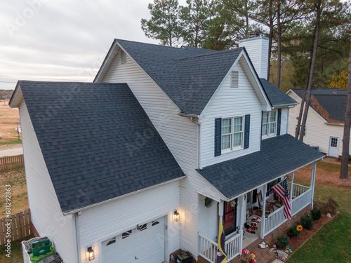 фотографія Aerial Drone Image of Newly Installed Asphalt Architectural Style Shingles On A