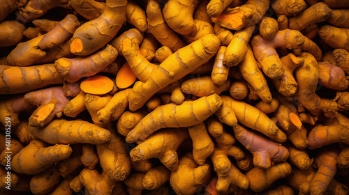 Top view full frame of whole ripe turmeric placed together as background. photo