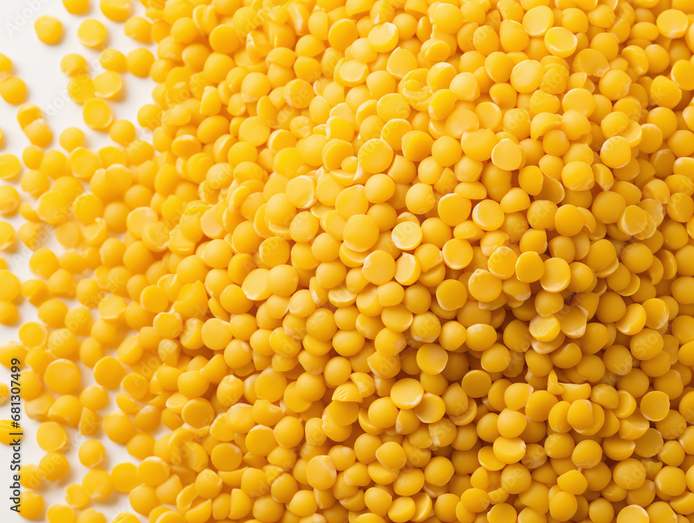 Yellow split lentils on white background. Yellow split lentils on white background.