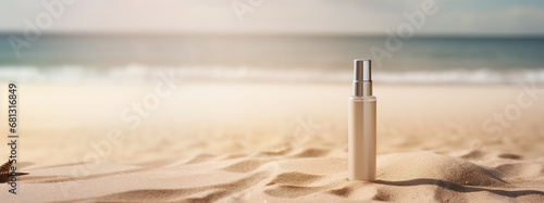 Cosmetic moisturizer with hyaluronic acid, micellar emulsion on sand beach background with splashes. Mockup of cosmetic packaging photo