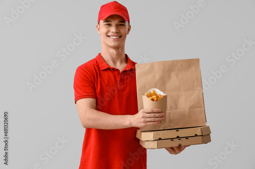 Young delivery man with fre...