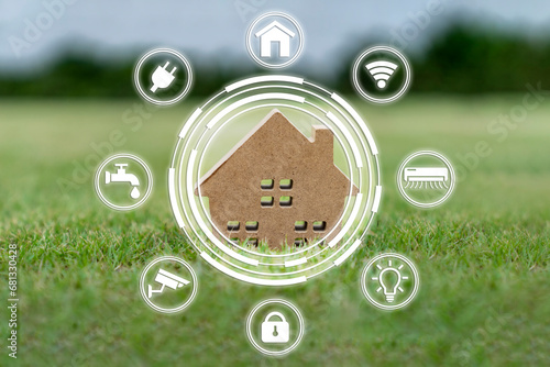 Smart home concept, Small house on green with smart technology icon.