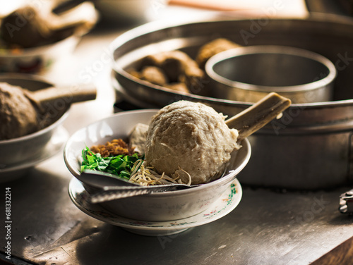 Bakso Iga (Ribs Meatball). This dish comes from Indonesia, originally combining bakso (meatball) with beef ribs. The giant size and the shape of bakso iga appear to look like a hammer or drumstick photo