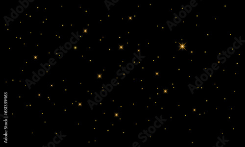 Glitter gold particles background effect for luxury greeting card. Christmas glowing light bokeh background texture.