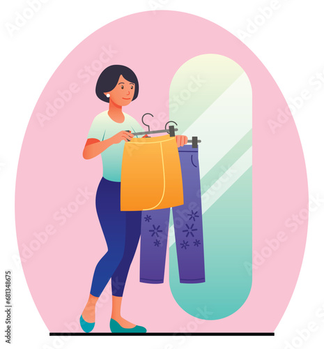 Woman trying on outfit next to mirror