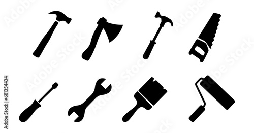 Tool or instrument icon collection in black. Construction tool silhouette icons. Screwdriver, wrench, wire cutter, drill, brush, hammer icons. Service and repair symbols photo