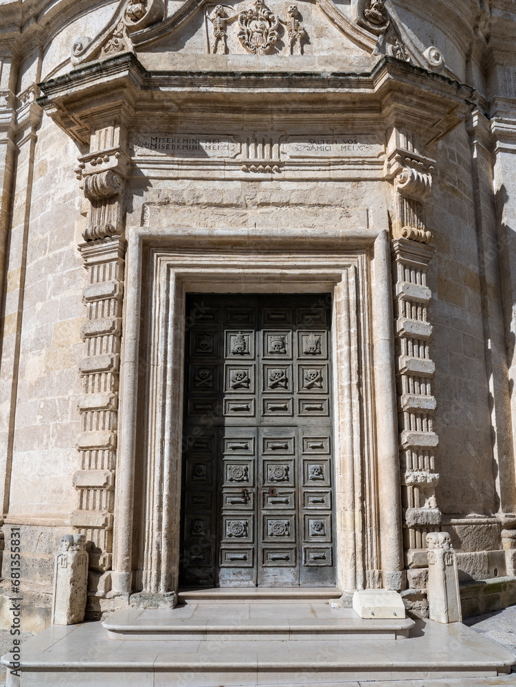 Matera, Italy. View of the main door of a church in Matera. View of the historical part of the town. An Unesco World Heritage Site. Touristic destination
