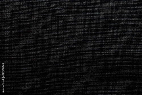 Carbon fiber background. Texture of black fabric for tailoring, Cloth