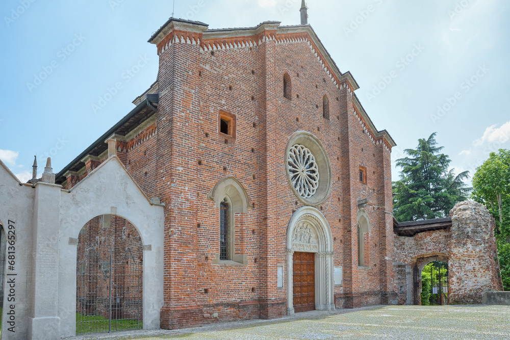 Old church with brick facade. Castiglione Olona, Italy with the Collegiate Church of Saints Stefano and Lorenzo from 1425 also called Collegiata
