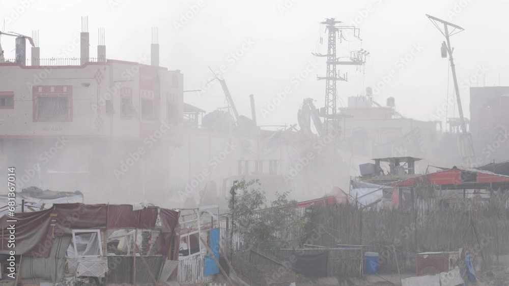 Collapsed buildings after an airstrike during Israel-Hamas War 2023, Gaza Collapsed buildings after an airstrike during Israel-Hamas War 2023, Gaza