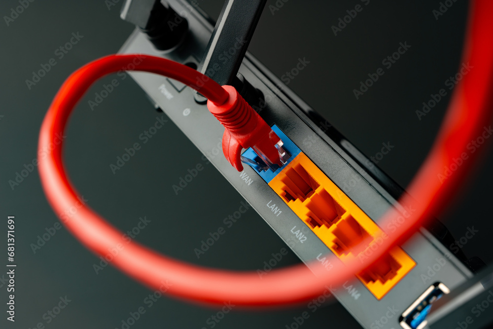 Modern router with cables plugged in close up Modern router with cables plugged in close up
