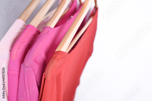Indoor shot of pastel blouses isolated on white background. Fashion style in fashion store. 