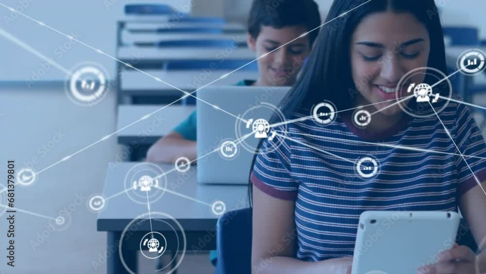 Animation of connected icons over diverse girl and boy using digital tablet and laptop in classroom