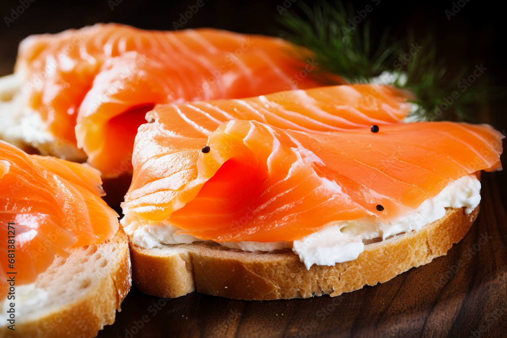 Sandwich made of fresh salmon and bread close-up. Lightly salted fish with fresh herbs and butter. Dietary healthy food. Sandwich made of fresh salmon and bread close-up. Lightly salted fish with fresh herbs and butter. Dietary healthy food.
