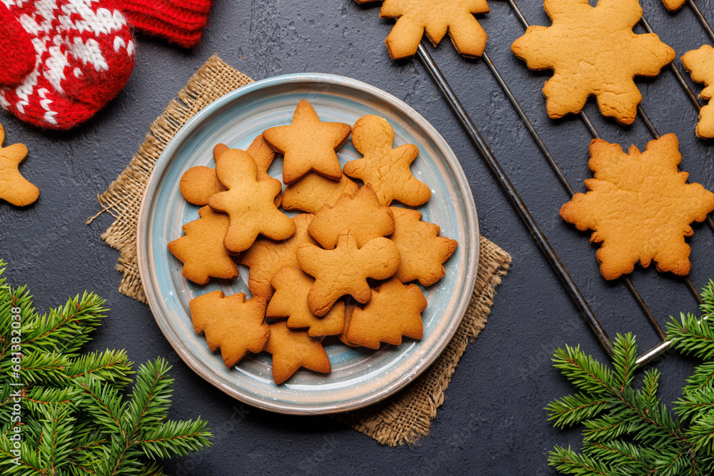 Fototapeta premium Gingerbread cookies and fir tree branch