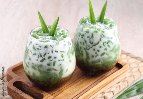 Cendol is a sweet dessert that contains droplets of green rice flour jelly, coconut milk and palm sugar syrup. It is served with shaved ice and is a refreshing snack in hot weather. 