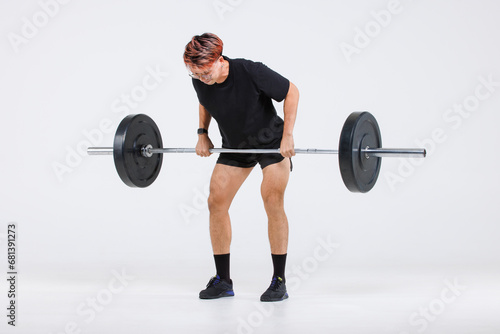 Isolated cutout full body studio shot of strong Asian male fitness athlete sportsman trainer model in casual sport workout outfit lifting barbell training exercising deadlift on white background