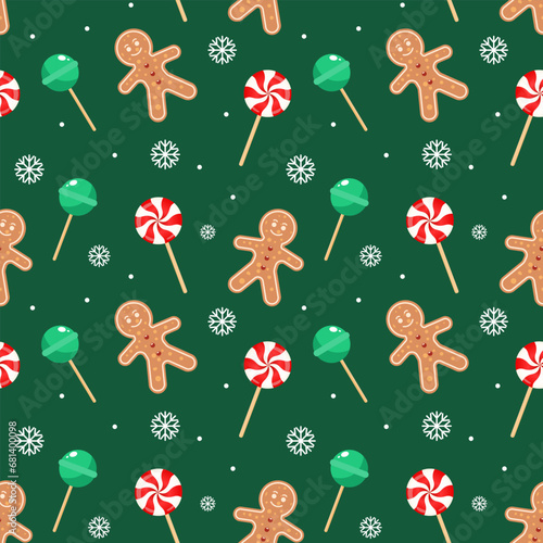 Christmas seamless pattern with gingerbread men, snowflakes, candy canes and socks. Festive green background, vector