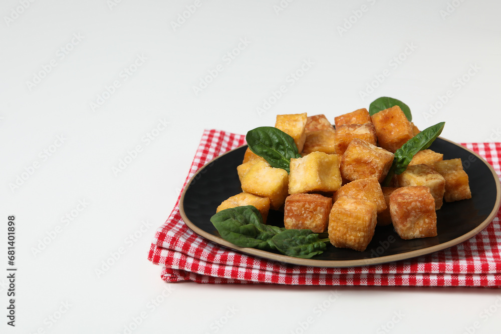 Fried tofu in a bowl on the table Fried tofu in a bowl on the table