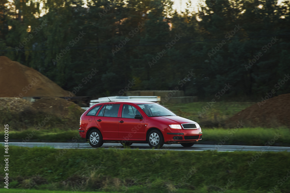 A New and Modern Station Wagon Car on the Highway. A Spacious and Elegant Vehicle for Family and Sport. How to Combine Practicality and Style in a Car. A Combi Car with a Powerful Engine.