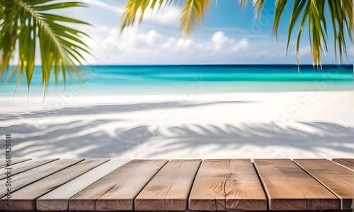 Close up empty wooden table under umbrella with beautiful white sand beach and tropical sea. Copy space. Outdoor nature backdrop.