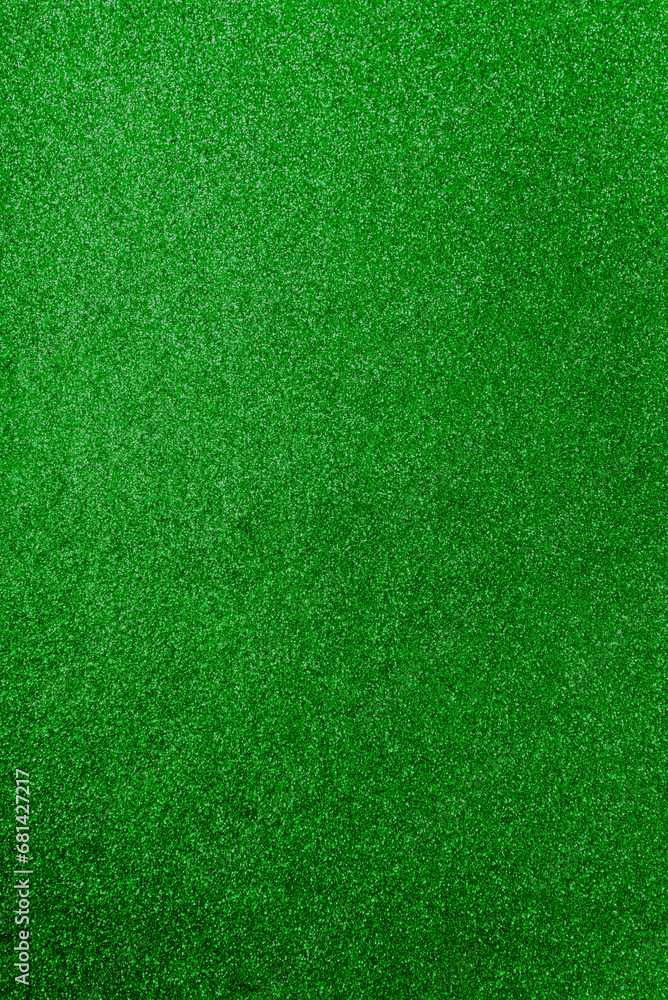 Green emerald blurred monochromatic background. Brilliant colored sequins. Holiday greeting card. Happy holidays. Minimal, flat lay, copy space. Mockup, vertical Green emerald blurred monochromatic background. Brilliant colored sequins. Holiday greeting card. Happy holidays. Minimal, flat lay, copy space. Mockup, vertical