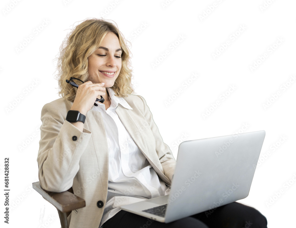 A smart consultant woman uses a laptop sitting in a chair in the office. The psychologist reads the client's messages and smiles for the positive feedback.