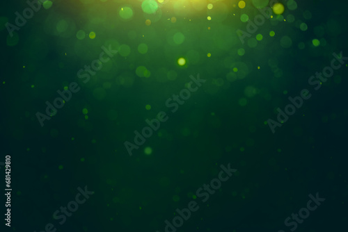 dark green background with gold out-of-focus backlight. festive background for St. Patrick's Day