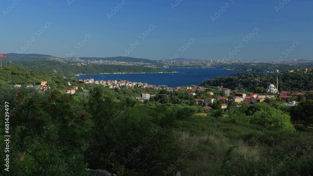 Seascape overlooking the coast of Istanbul. The ship sails and leaves a foamy trail in the water. Seascape overlooking the coast of Istanbul. The ship sails and leaves a foamy trail in the water.