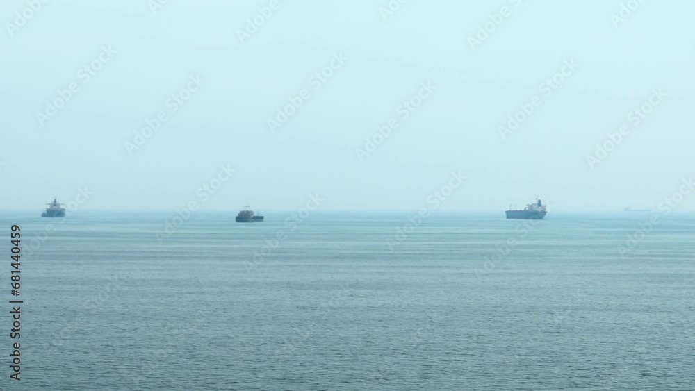 Seascape overlooking the coast of Istanbul. The ship sails and leaves a foamy trail in the water. Seascape overlooking the coast of Istanbul. The ship sails and leaves a foamy trail in the water.