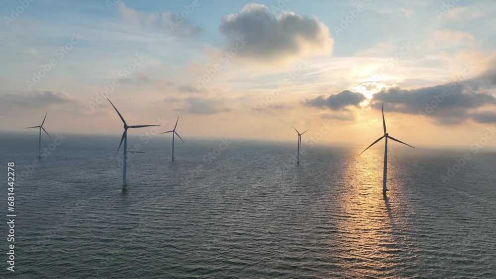 Wind farm in the sea. Clean energy production. Video background. Technology and innovation. Aerial view. Industrial landscape from a drone. View from above. Wind farm in the sea. Clean energy production. Video background. Technology and innovation. Aerial view. Industrial landscape from a drone. View from above.