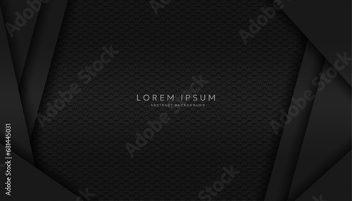 Modern hexagonal black material texture background overlaid with black paper
