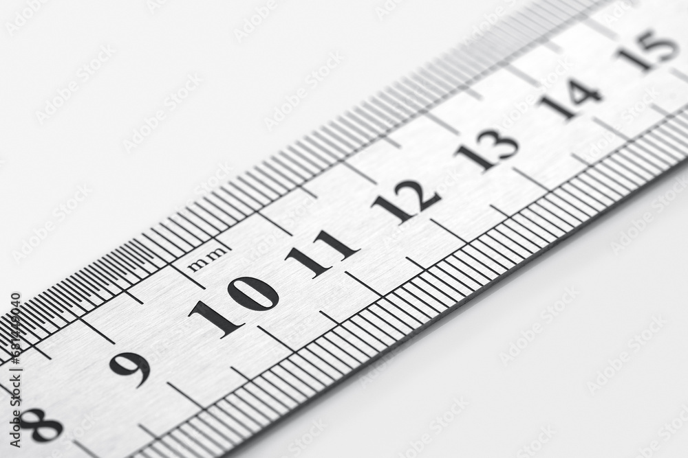 School metal ruler isolated on white background.Metric steel ruler, isolated on white. 30cm. School metal ruler isolated on white background.Metric steel ruler, isolated on white. 30cm.